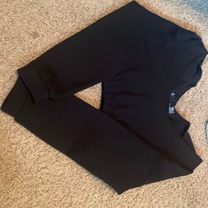 A crop shirt, never worn, shoulders are free, bought it at Ross